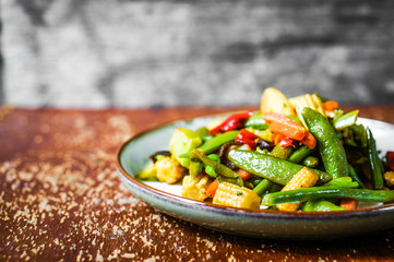 Baked vegetables on rustic background