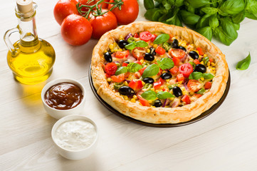 Pizza on wooden table