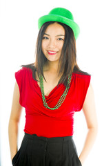 Naklejka premium Young woman standing with her hands in pockets
