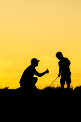 Golf sunset silhouette