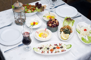 Arabic food of dates, hommos, cheese, labneh and fattoush