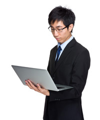 Businessman look at laptop computer
