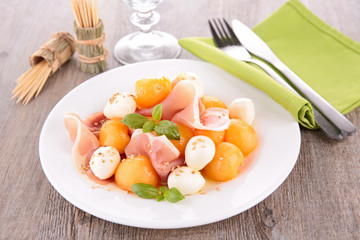 salad with melon,mozzarella and prosciutto
