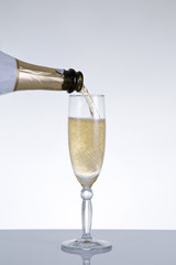 Champagne pouring into a glass