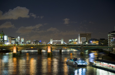Naklejka premium London at night, looking towards Tower bridge.