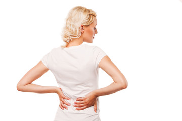 Woman with backache. Female holding her painful back