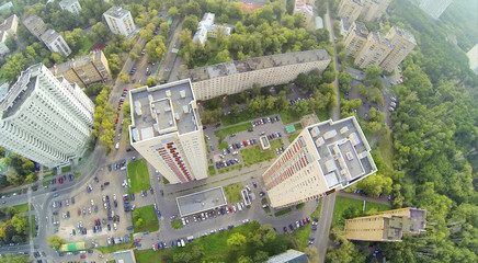 Above view of two high residential buildings in neighborhood.