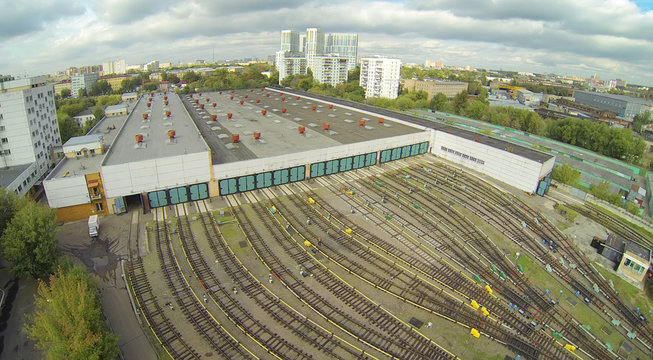 Depot with many railways at day in city at cloudy day