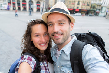 Young couple on holidays taking selfie