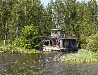 Old river pontoon house
