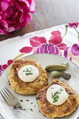 crab cakes with a creamy mustard sauce and fresh parsley