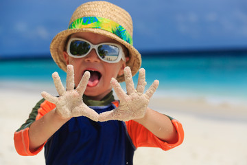little boy having fun on beach vacation © nadezhda1906