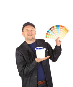 Worker with color samples.