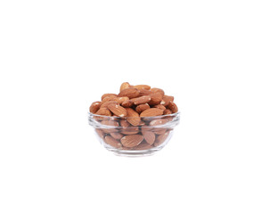 Glass bowl full with almonds.