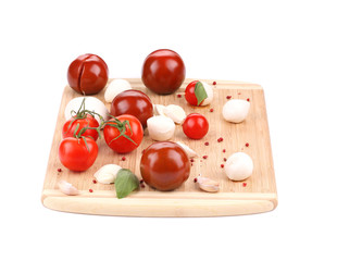 Tomatoes and mozzarella balls.