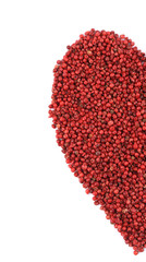 Obraz na płótnie Canvas Dried red pepper in shape of heart half.