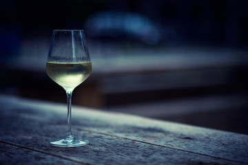 color image of chilled white wine in a glass , with copy space