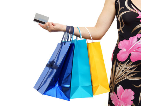 closeup of picture of woman with shopping bags and credit card
