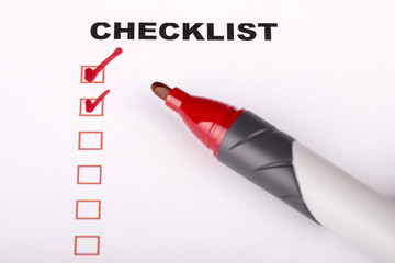Checklist on white with marker