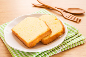 Butter cake sliced on plate