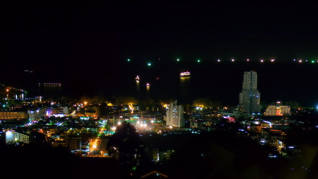 Timelapse shot of Patong city at night, radar mountain view.. FullHD 1080p.