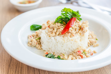 Spicy fried chicken with basil and rice