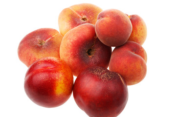 peaches and nectarines on a white background