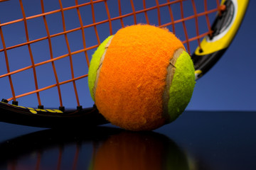 Tennis ball for children with tennis racket