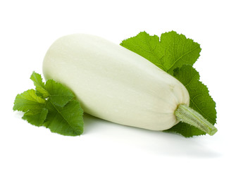 Fresh zucchini fruit with green leaves