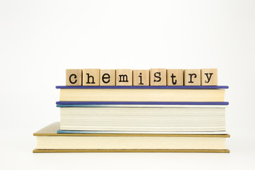 chemistry word on wood stamps and books