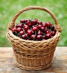 Fototapeta na wymiar Some beautiful sweet cherry fruit in basket