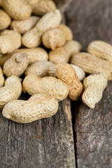 peanuts on an old wooden surface