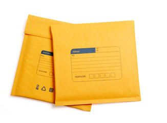 Yellow letter envelope isolated with clipping path.