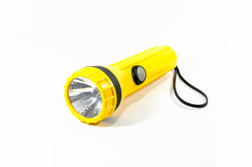 yellow plastic torch flashlight isolated on white