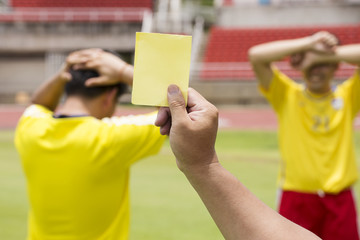 soccer referee show yellow card