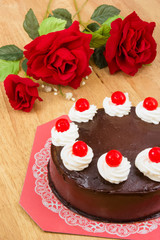 chocolate cake with red Jelly on top