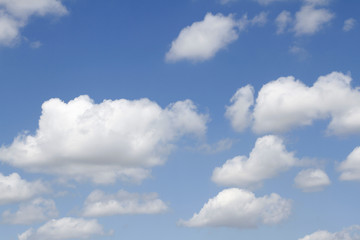 White soft clouds in blue sky