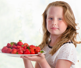 little girl with  strawberry