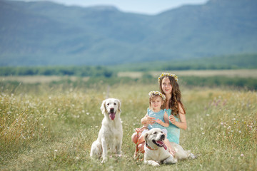 Beautiful girl playing with her dog. Outdoor portrait.