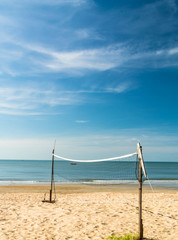 Beach volleyball net on the beach.