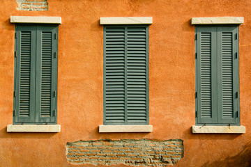 Fototapeta na wymiar Window on orange wall