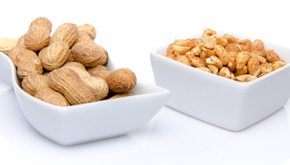 Whole and roasted peanuts in cups