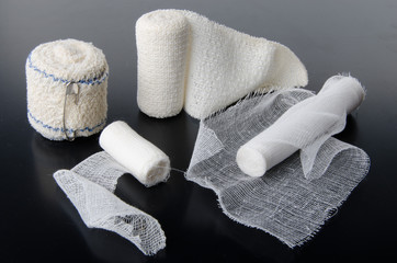 Different rolls of medical bandages