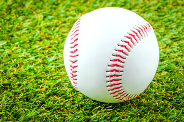 Baseball on green grass
