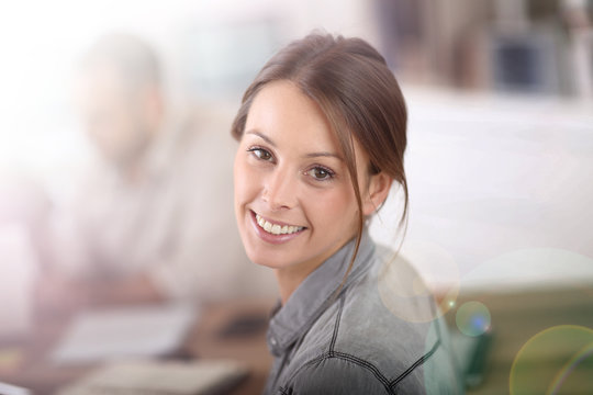 Young woman attending business training class