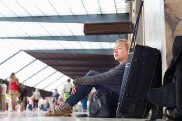 Female traveler waiting for departure.