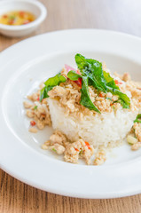 Spicy fried chicken with basil and rice