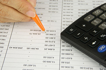 Man hold orange pen  planning finance
