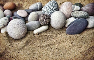 Fototapeta na wymiar Background rocks and sand closeup