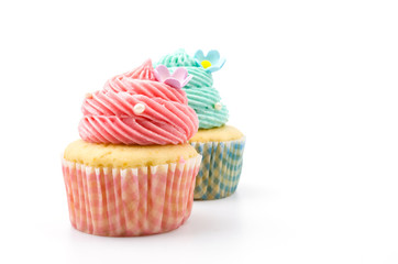 Vanilla cupcakes isolated white background